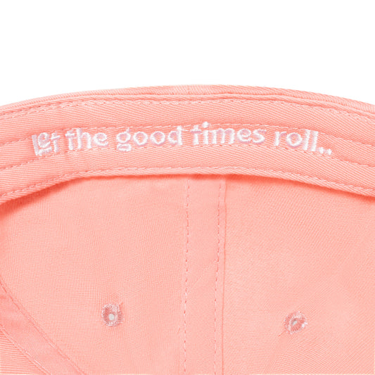 Pink King's Hawaiian hat interior that reads, "Let the good times roll.."